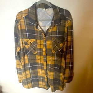 Gray and Mustard Yellow flannel.  Soft material.  Size large but oversized fit